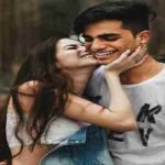 girl kisses boy after giving her number